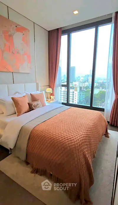 Luxurious bedroom with stunning city view and elegant decor