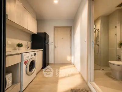 Modern apartment interior with washing machine and bathroom view