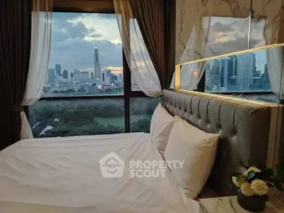 Luxurious bedroom with stunning city skyline view and elegant decor