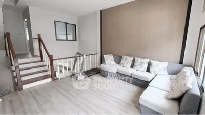 Spacious living room with modern decor and cozy sectional sofa