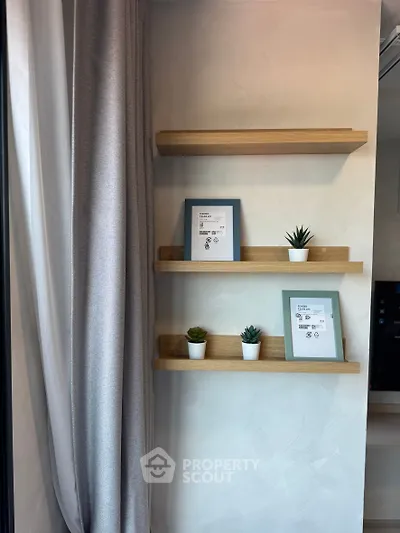 Stylish interior with floating shelves and decorative plants in modern living space.