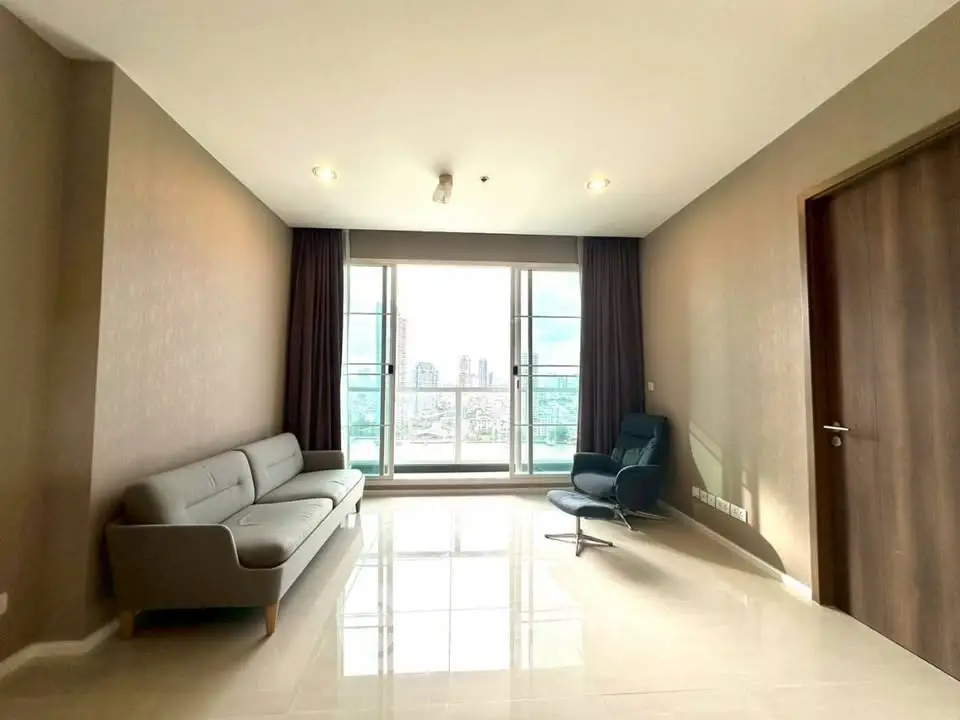 Spacious modern living room with city view and elegant furnishings