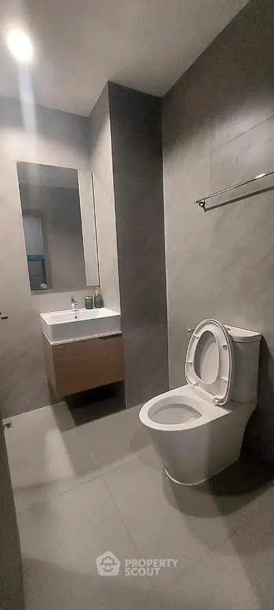 Modern bathroom with sleek design and contemporary fixtures.