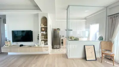 Modern open-plan living room with stylish kitchen and elegant decor