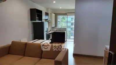 Modern living room with cozy sofa and stylish decor