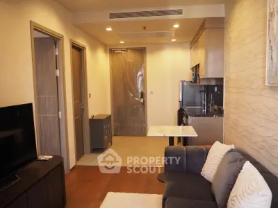 Modern apartment interior with cozy living room and compact kitchen