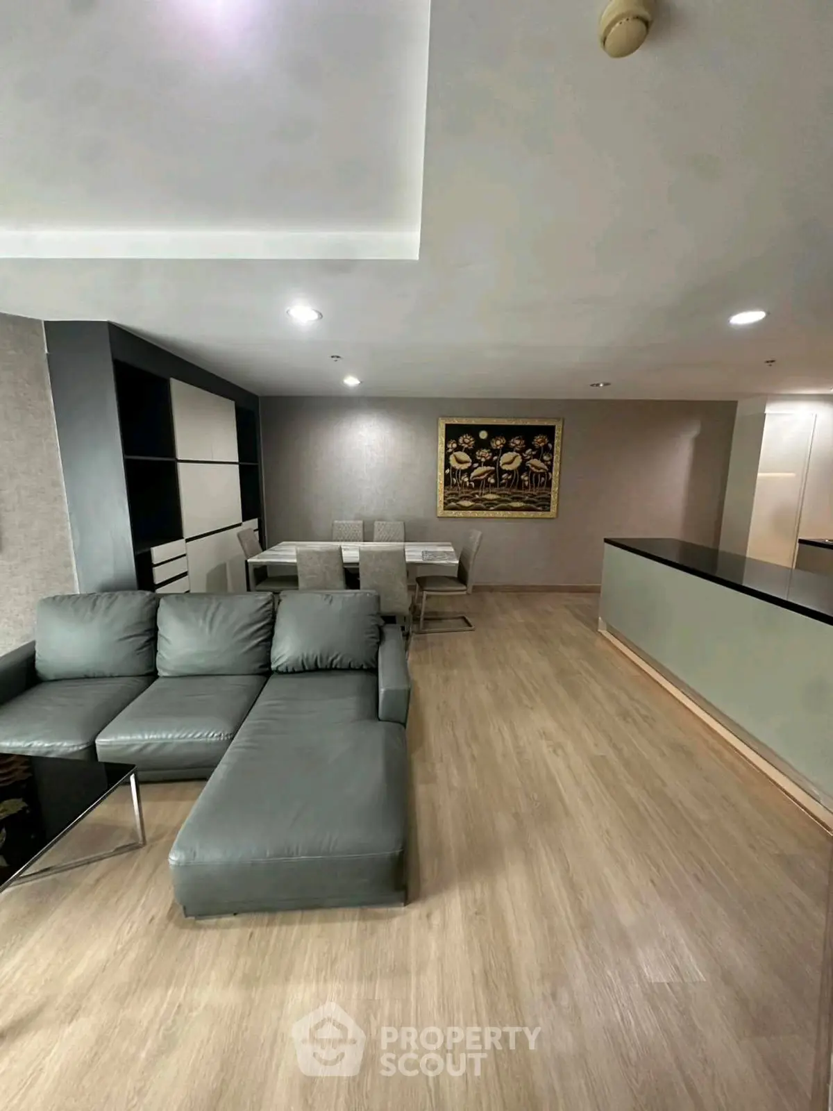 Spacious modern living room with sleek furniture and open layout