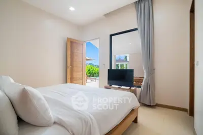 Spacious bedroom with outdoor view and modern decor