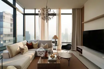 Luxurious living room with panoramic city views and elegant modern decor.