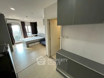 Modern studio apartment with balcony and natural light