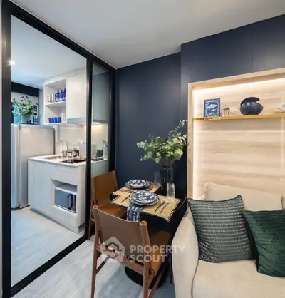 Modern compact kitchen with open layout and stylish dining area
