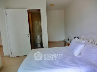 Cozy bedroom with ensuite bathroom and modern decor