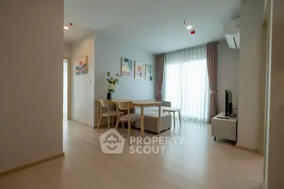 Modern living room with minimalist decor and natural light