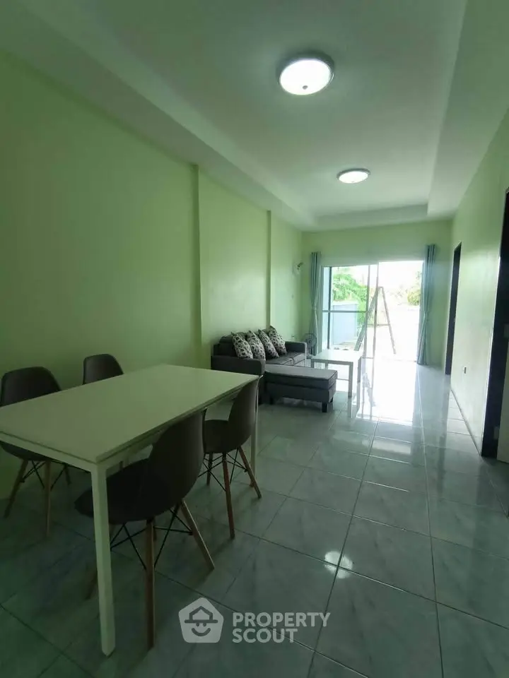 Spacious living room with modern furniture and natural light