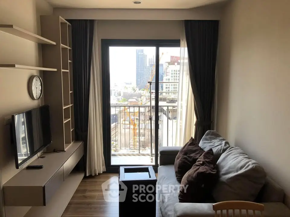 Modern living room with balcony view in urban apartment