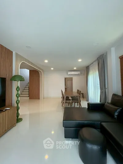 Spacious modern living room with sleek furniture and elegant design