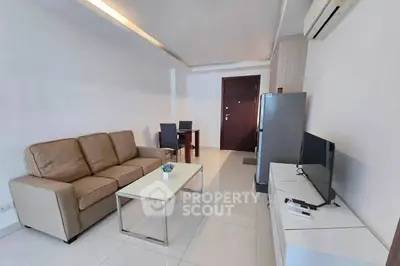 Modern living room with sleek furniture and air conditioning in a cozy apartment.