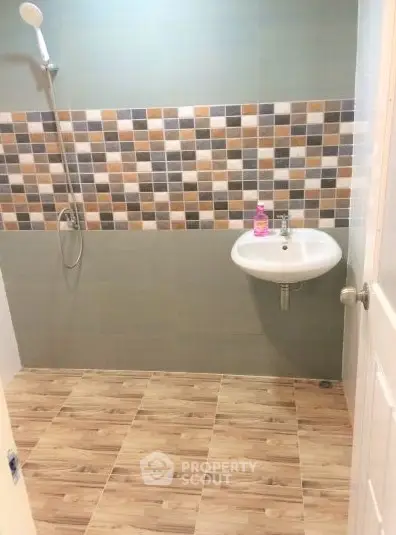 Modern bathroom with stylish tile design and sleek fixtures