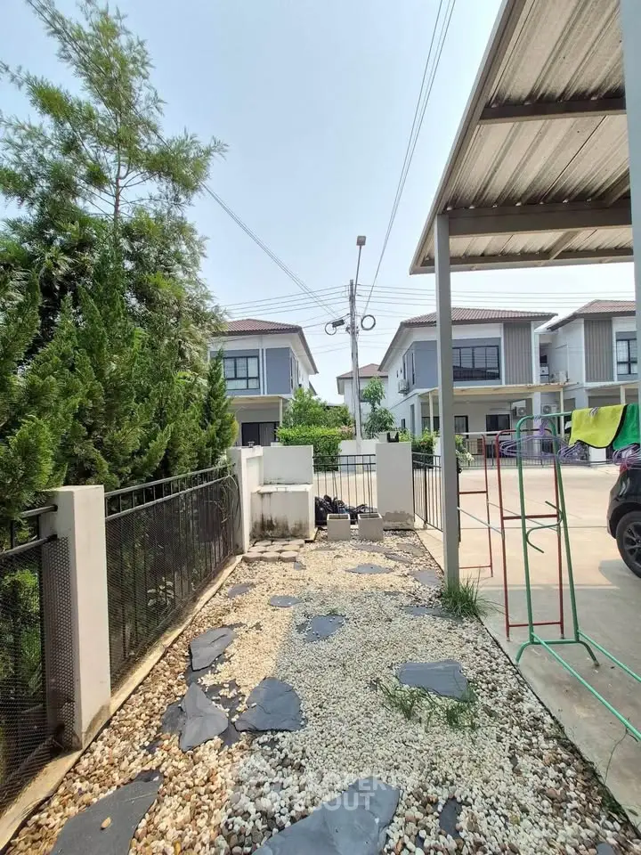 Charming suburban neighborhood with modern houses and landscaped gardens, perfect for family living.