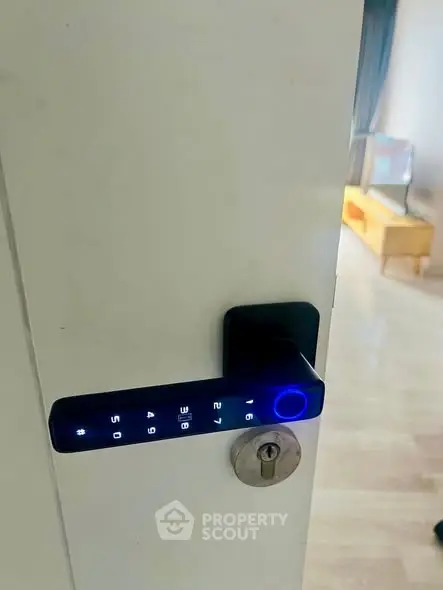 Modern smart lock on interior door with sleek design and digital keypad