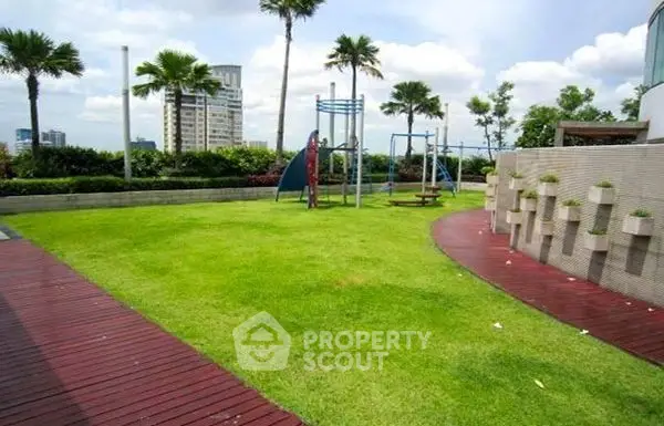 Luxurious rooftop garden with lush greenery and city views, perfect for relaxation and leisure activities.