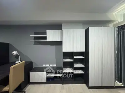 Modern study room with sleek storage and workspace, ideal for productivity and organization.