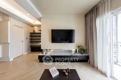 Modern living room with sleek TV setup and elegant decor