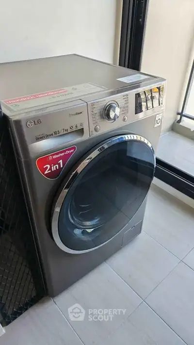 Modern 2-in-1 washer dryer on a balcony with sleek design and efficient functionality.