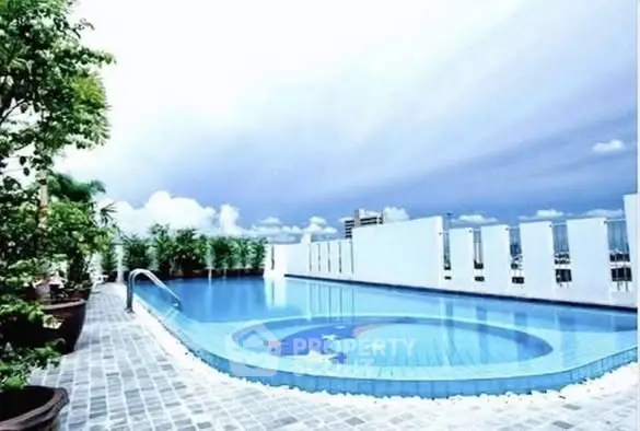 Luxurious rooftop pool with stunning city views and modern design.