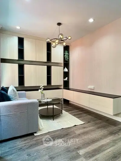 Modern living room with stylish furniture and elegant lighting