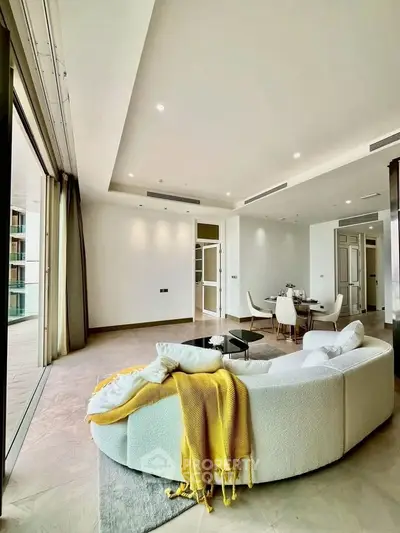 Luxurious modern living room with elegant furniture and open layout, perfect for stylish urban living.