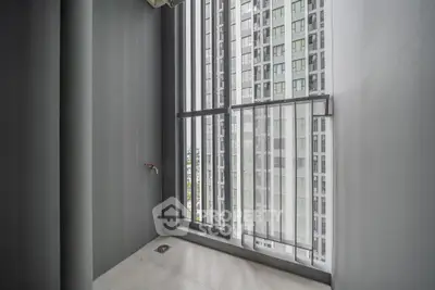 Modern high-rise balcony with sleek design and city view