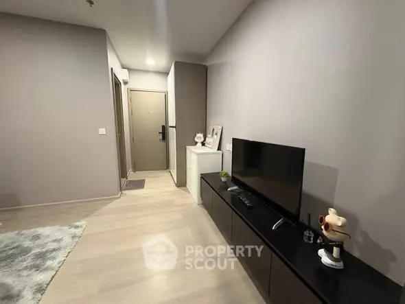 Modern living room with sleek TV stand and minimalist decor