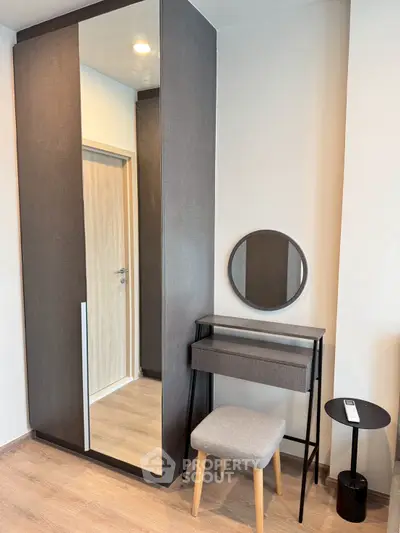 Modern bedroom with stylish wardrobe and vanity set