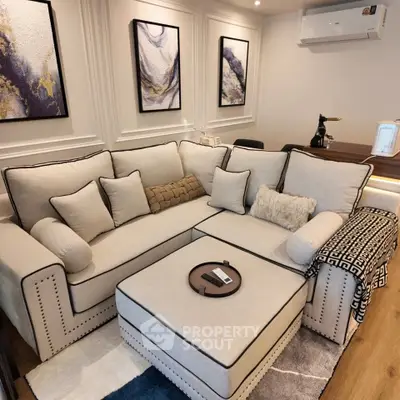 Elegant living room with plush sectional sofa and modern decor