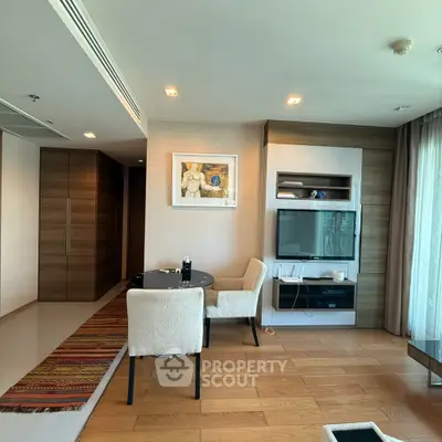 Modern living room with stylish decor and wooden flooring