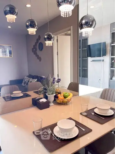 Modern dining area with elegant lighting and stylish decor