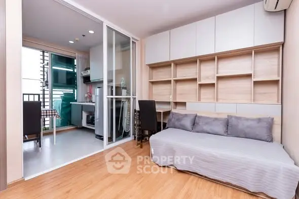 Modern studio apartment with open layout and stylish furnishings