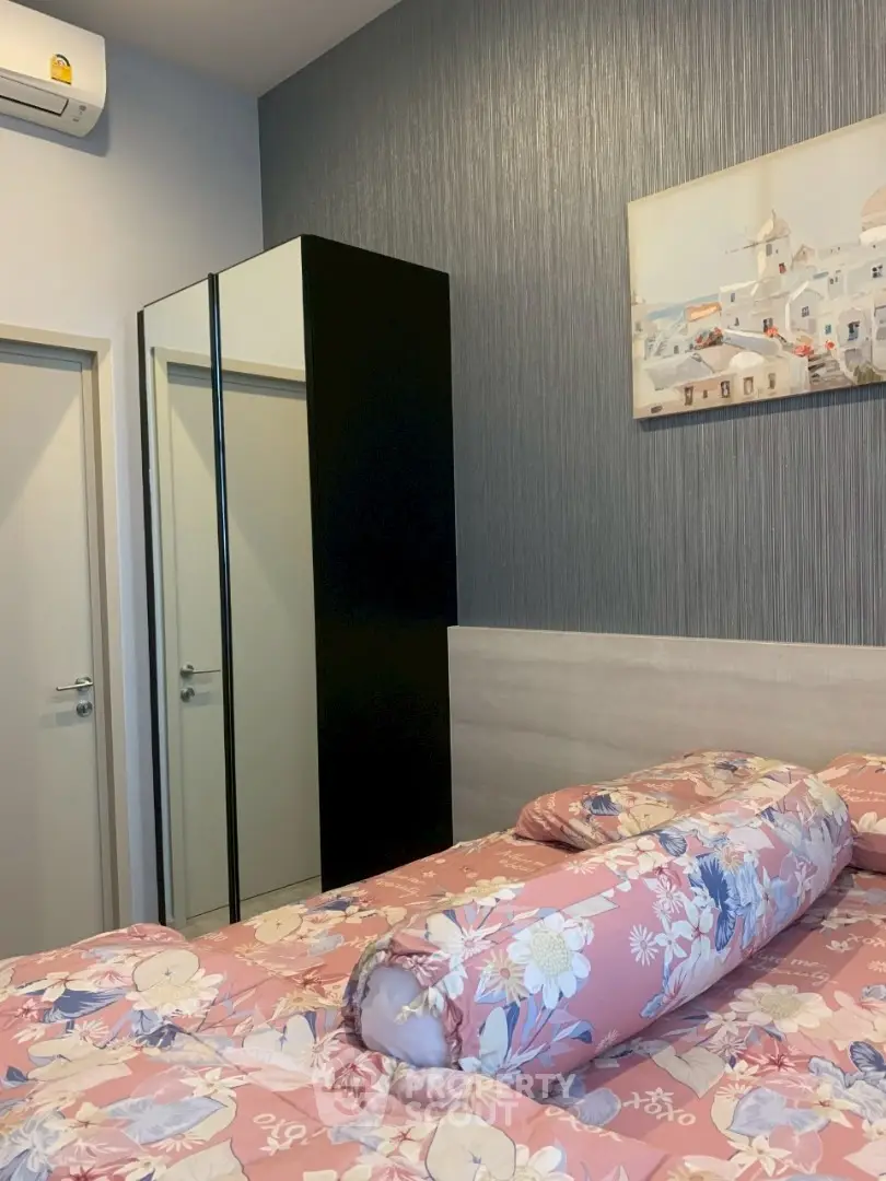 Cozy bedroom with floral bedding and modern decor