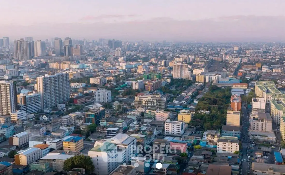 Stunning aerial view of a bustling cityscape with diverse architecture and vibrant urban life.