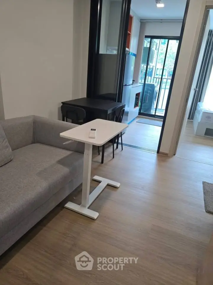Modern apartment interior with cozy living area and open kitchen layout