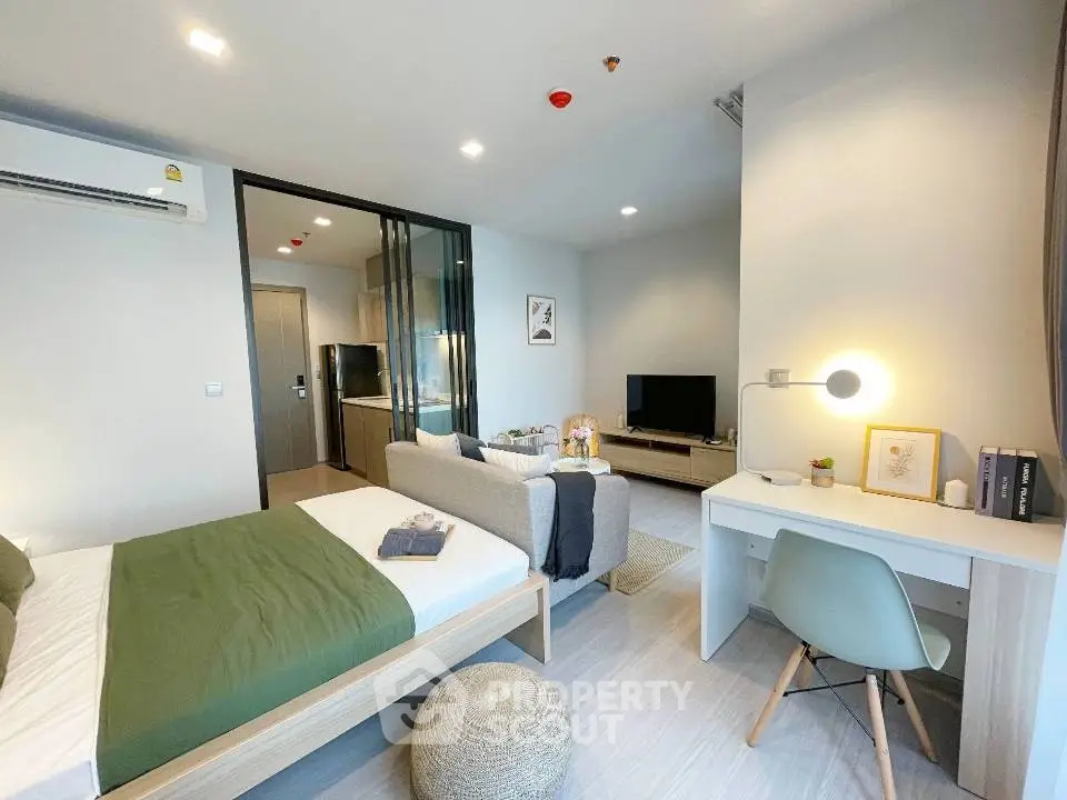 Modern studio apartment with stylish decor and open layout