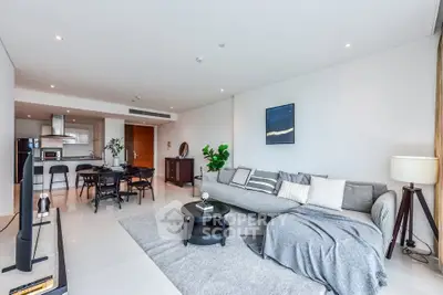 Modern open-plan living room with stylish decor and spacious layout