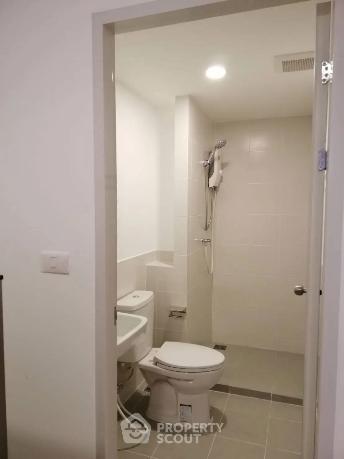 Modern bathroom with shower and toilet in minimalist design