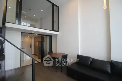 Modern loft apartment with high ceilings and stylish interior design