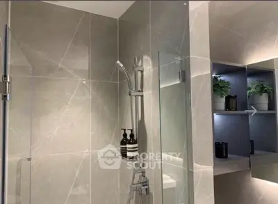 Modern bathroom with sleek shower and elegant decor