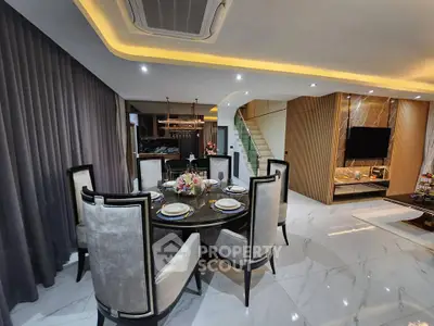 Luxurious modern living room with elegant dining area and stylish decor