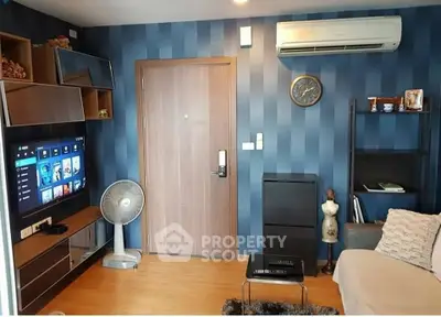 Modern living room with stylish decor and entertainment setup