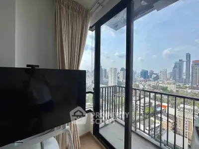 Modern apartment with city view from balcony and large window