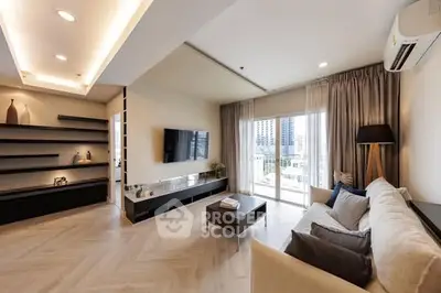 Spacious modern living room with elegant decor and city view